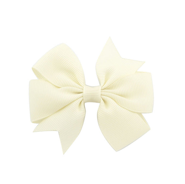 Antique White Bow Clip