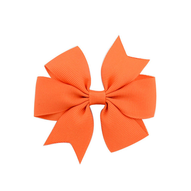 Torrid Orange Bow Clip