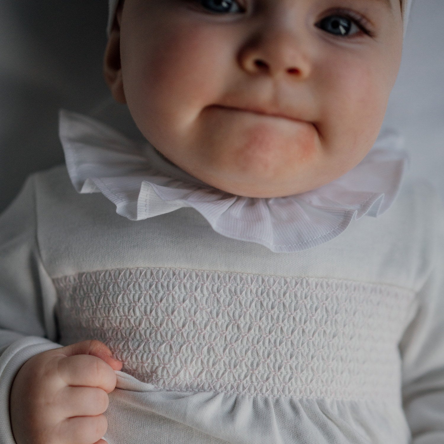 Baby Pink Hand Smocked White All-in-one