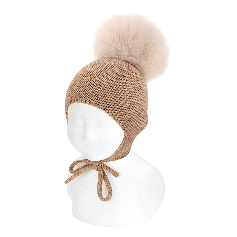 Condor Merino blend knit hat w/earflaps and faux fur pompom Biscuit